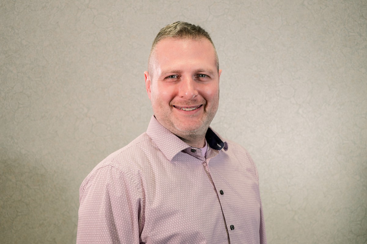 Dr. Joshua Bruce, orthodontist, photographed by the practice.